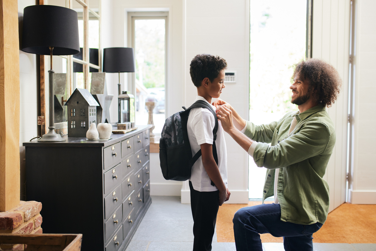 dad and son getting back into routine for school.