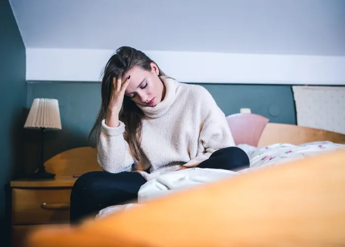 woman with issues sleeping during the winter.