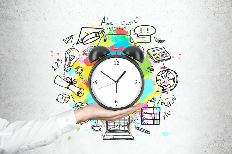 A person holding a clock with a bunch of different drawn graphics around it showcasing adhd time management.